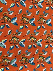Motif tissu coton singe orange